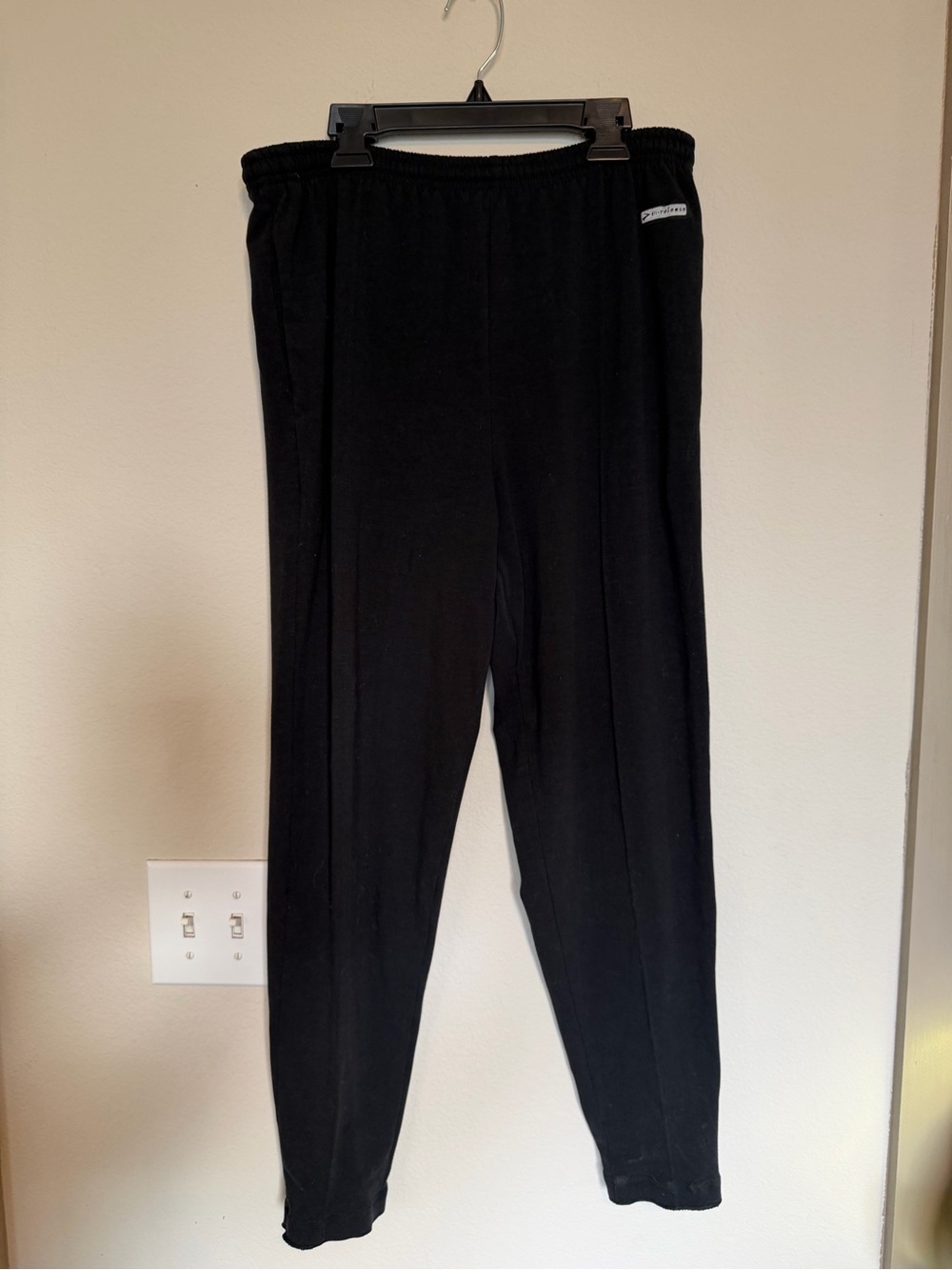 Brooks black athletic pants with gray logo